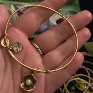 Gold Alex and Ani Bracelet with oyster charm